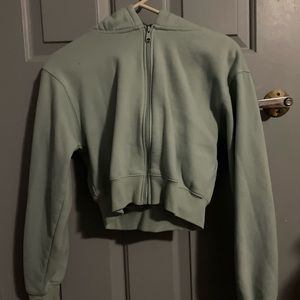 cropped zip up